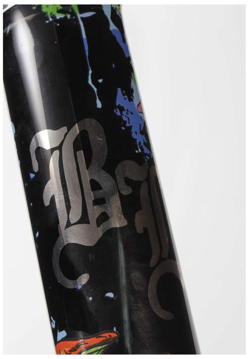 Close-up of a black bong with colorful splashes and 'TB' logo on a white background