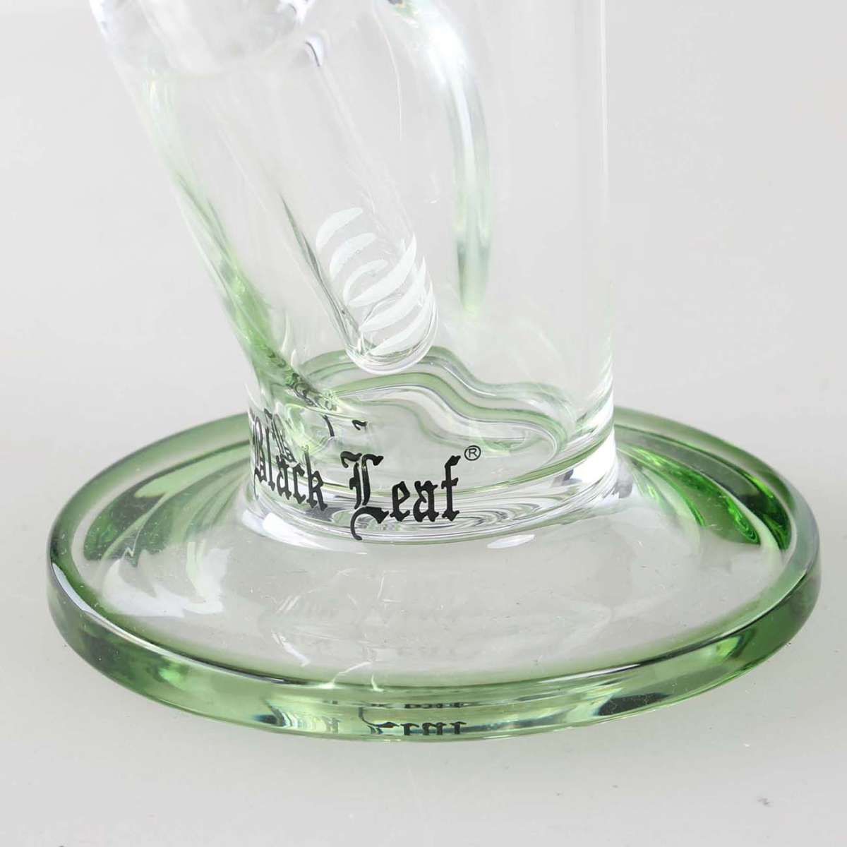 Clear glass bong with 'Black Leaf' branding on a white background