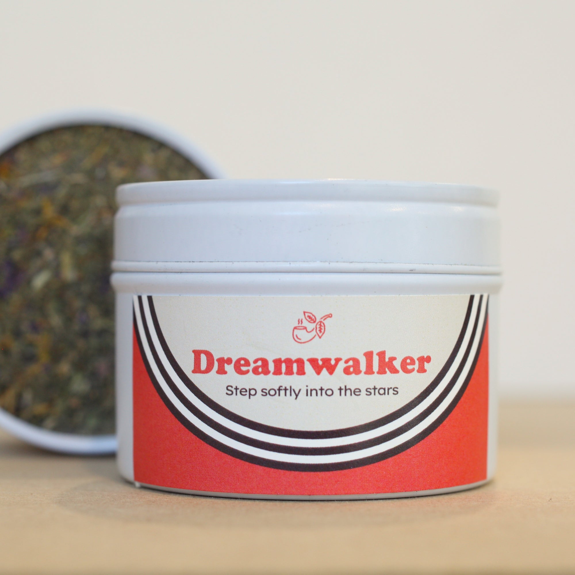Nobacco Tobacco substitute canister labeled 'Dreamwalker' with the tobacco substitute leaves visible inside.
